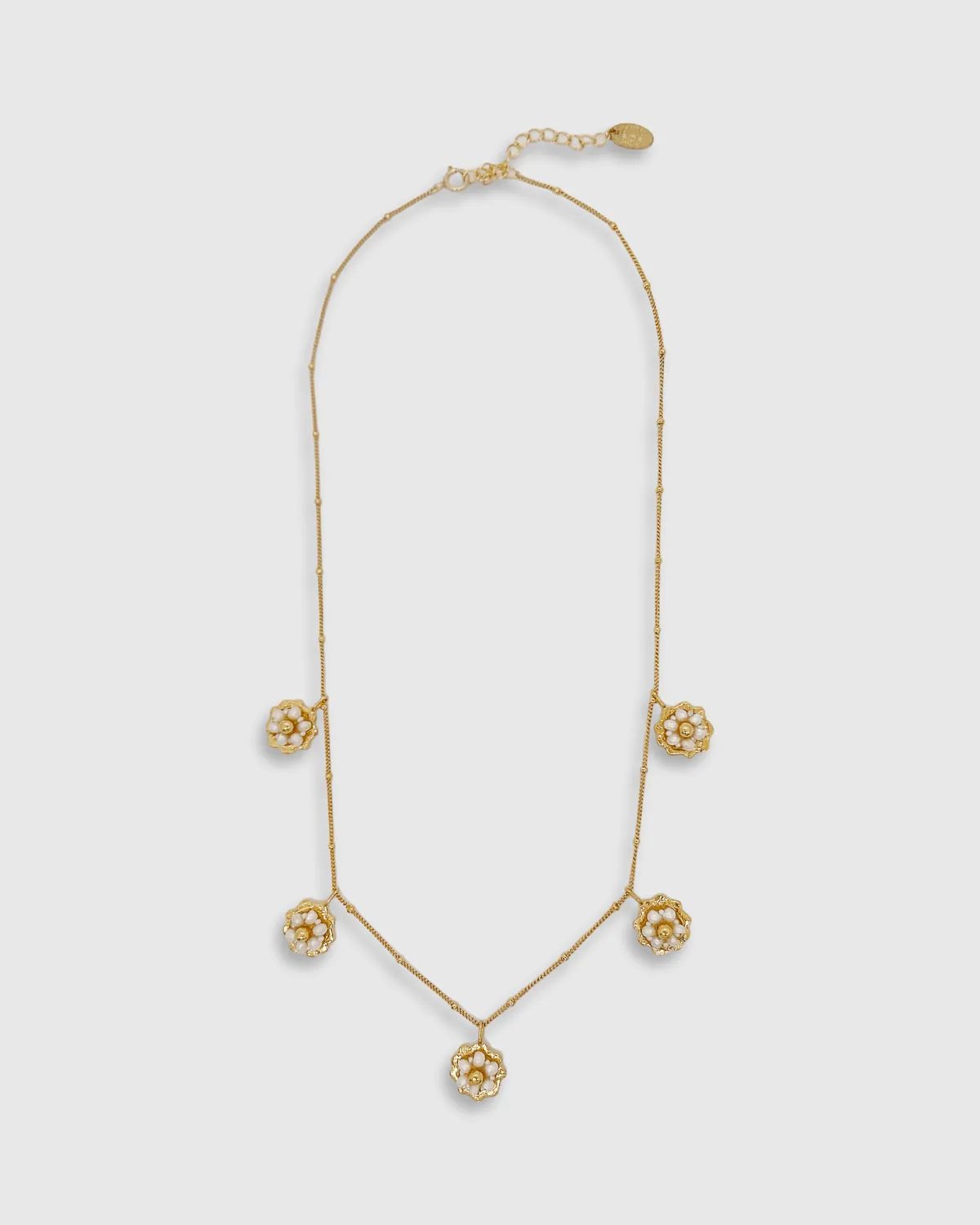 Elise Tsikis Ikaria Kioni collier fleurs nacre