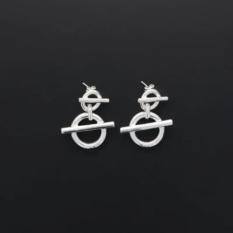 Secret de Cuir N°1422 boucles d'oreilles rond barre argentées