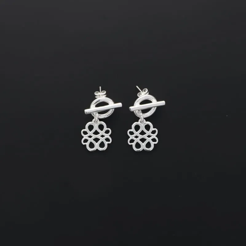 Secret de Cuir N°1511 boucles arabesque argentées plaqué