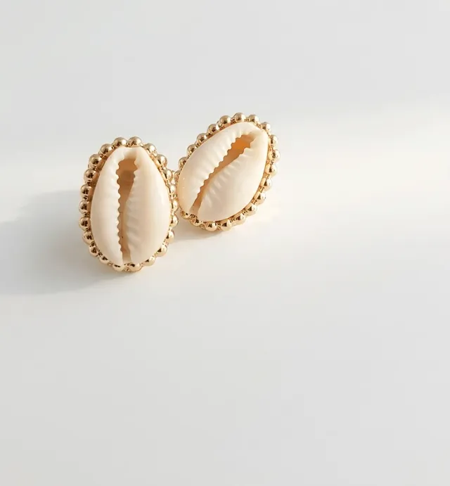 Elise Tsikis Santorini boucles cauri doré archive