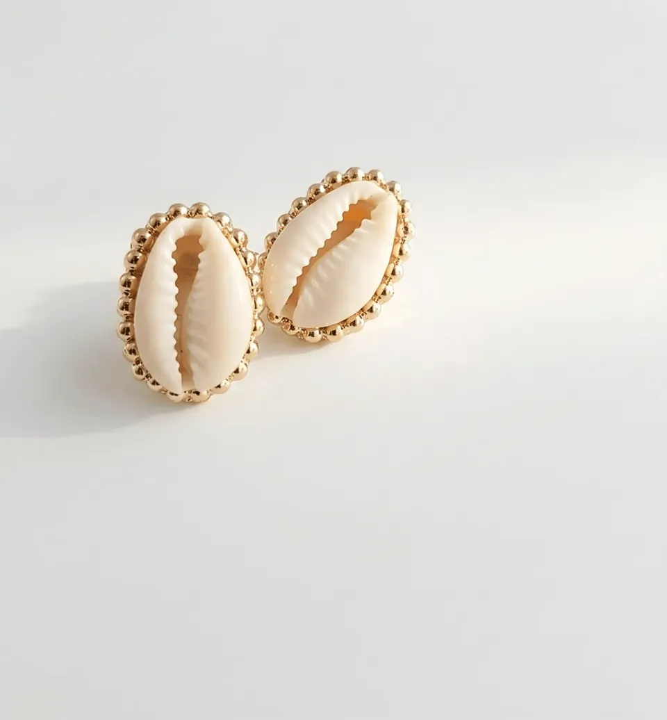 Elise Tsikis Santorini boucles cauri doré archive