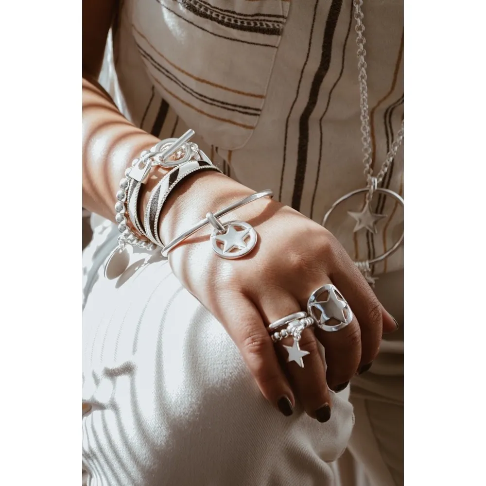 Secret de Cuir N°606 bague étoile argentée