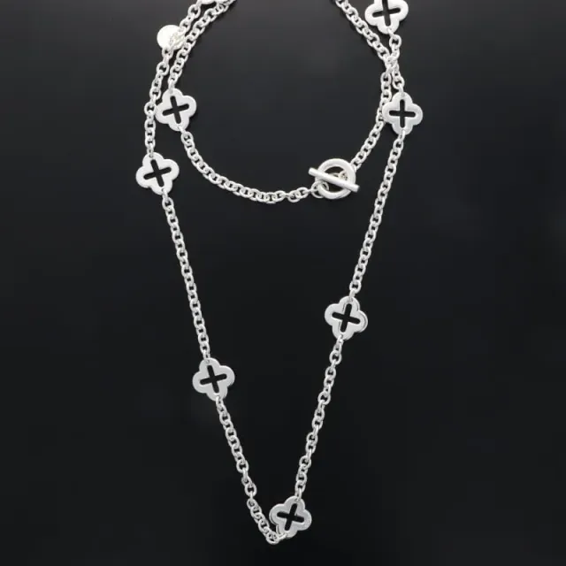 Secret de Cuir N°1582 sautoir 4 feuilles plaqué argent