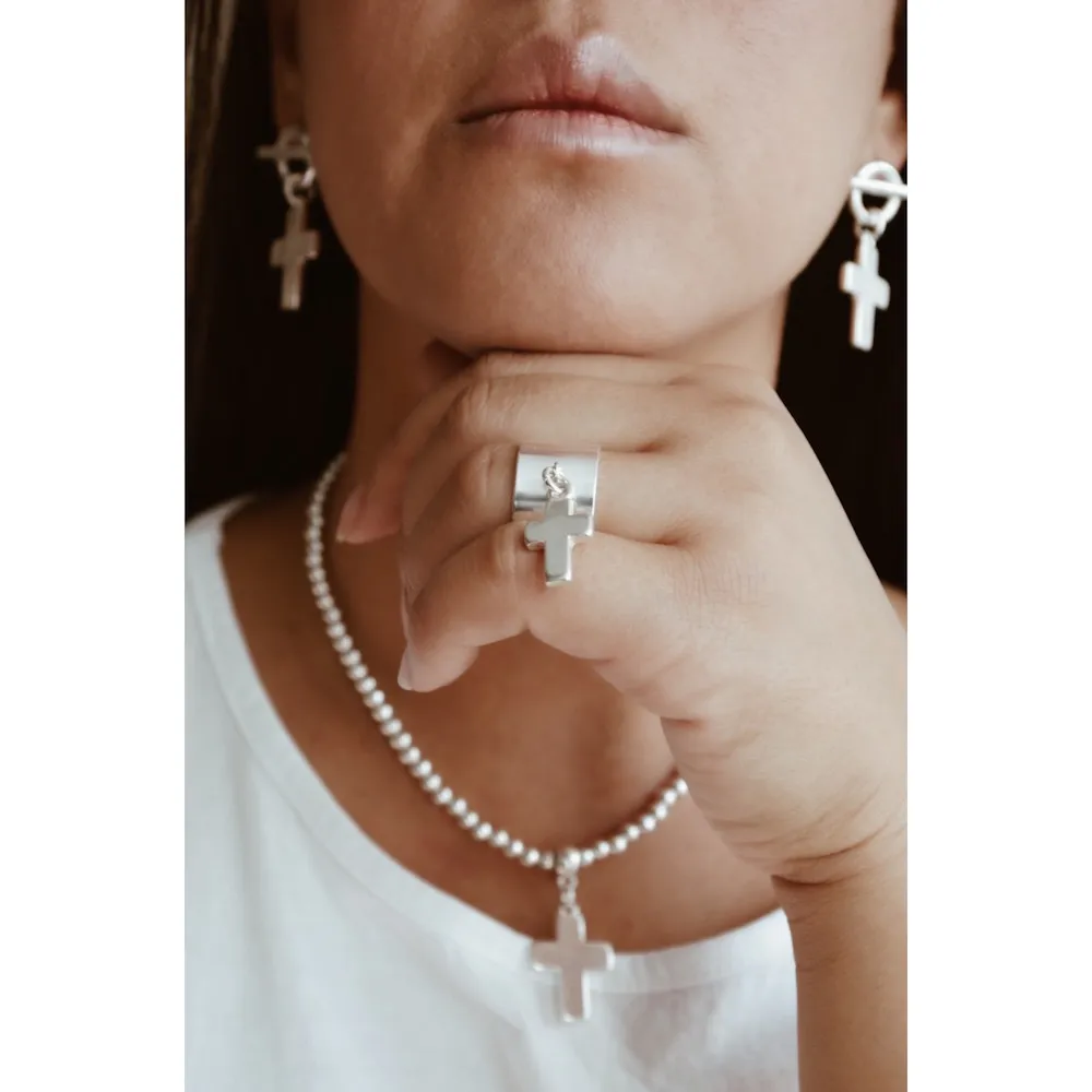 Secret de Cuir N°900 boucles d'oreilles croix plaqué argent
