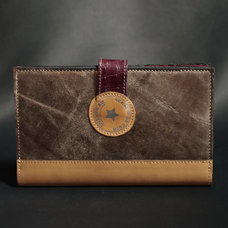 Secret de Cuir Portefeuille PM bouton prune cuir