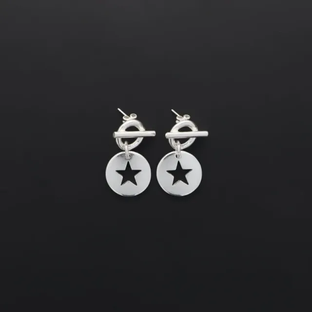 Secret de Cuir N°1323 boucles d'oreilles étoile évidée argenté