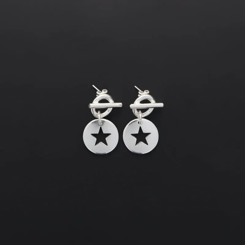 Secret de Cuir N°1323 boucles d'oreilles étoile évidée argenté