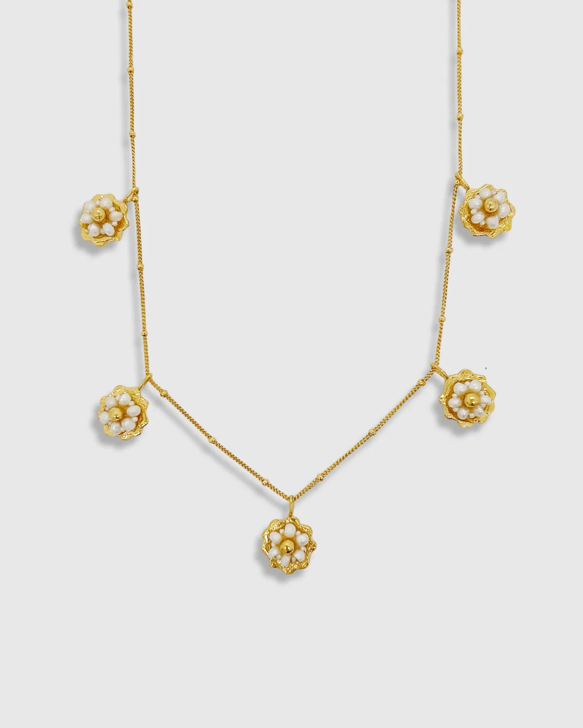 Elise Tsikis Ikaria Kioni collier fleurs nacre