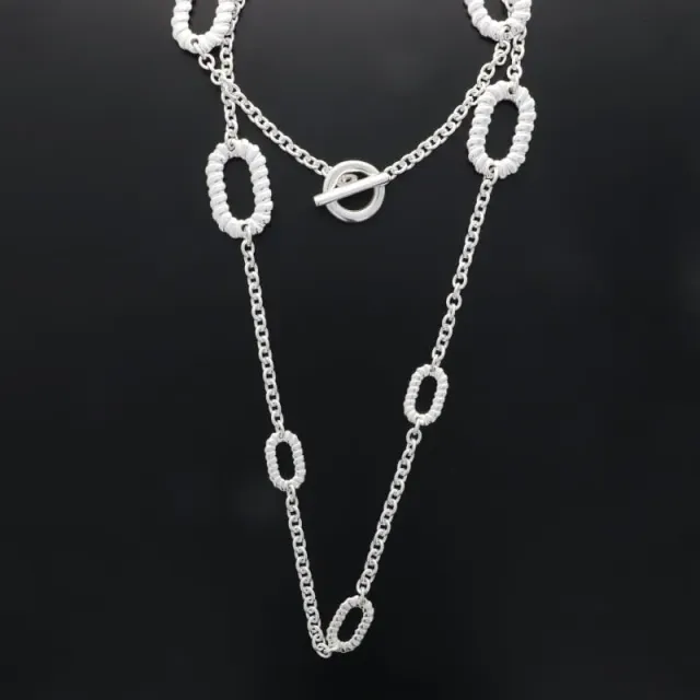 Secret de Cuir N°1583 ovales torsadés sautoir argenté