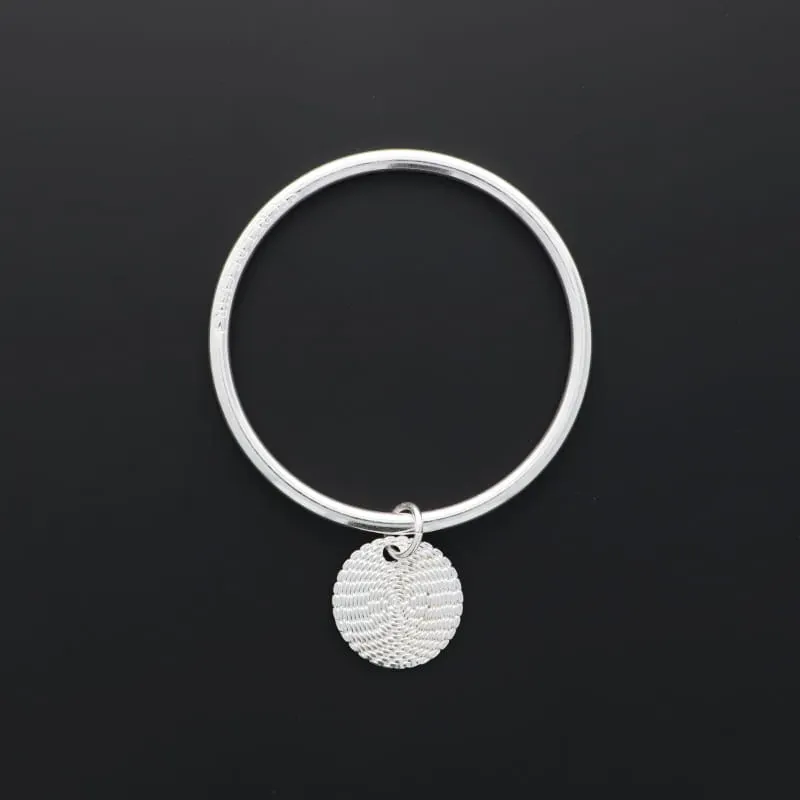 Secret de Cuir N°725 jonc pastille striée argenté