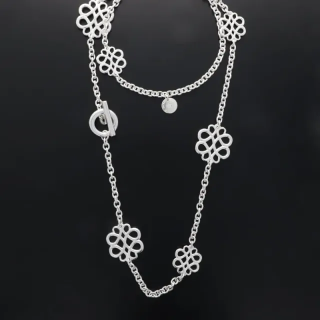 Secret de Cuir N°1584 sautoir arabesque argenté