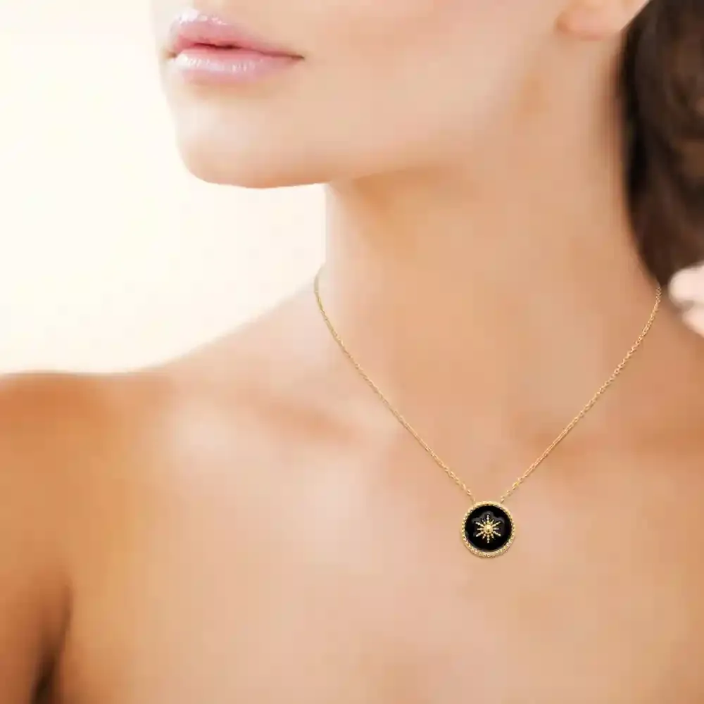 Oriana France collier soleil laque noire plaqué or