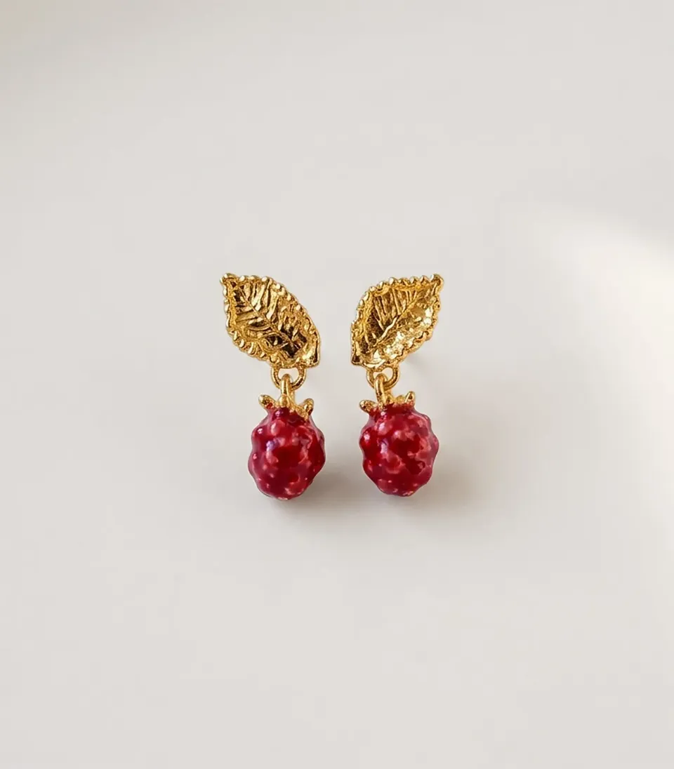 Elise Tsikis Nolina boucles d’oreilles feuille doré