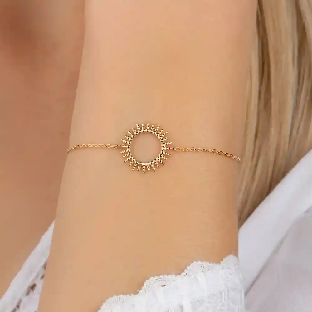 Oriana France bracelet soleil ajouré plaqué or doré