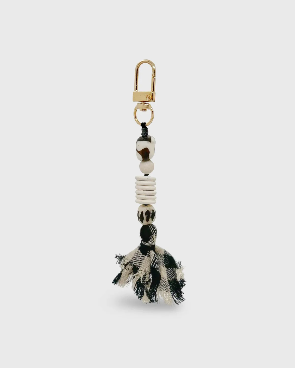 Elise Tsikis Larissa bijou de sac howlite pompon