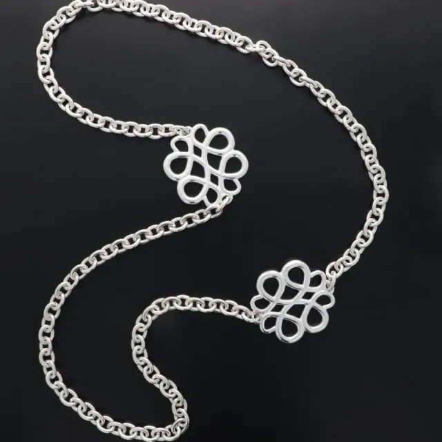Secret de Cuir N°1585 sautoir 2 arabesques argenté plaqué