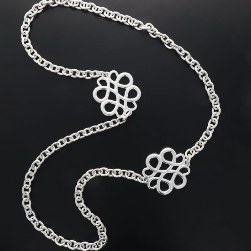 Secret de Cuir N°1585 sautoir 2 arabesques argenté plaqué
