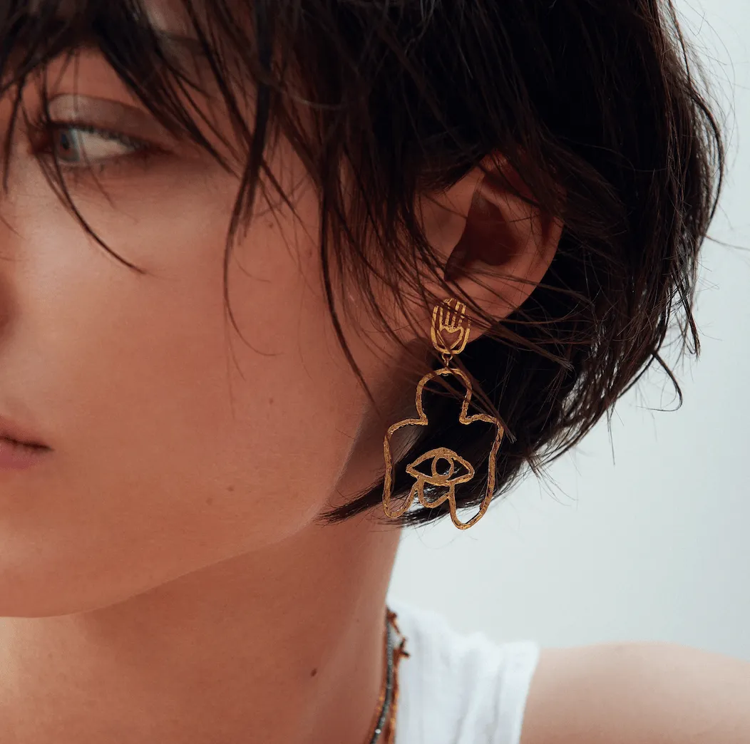 Elise Tsikis Cuerpomano boucles ange dorées