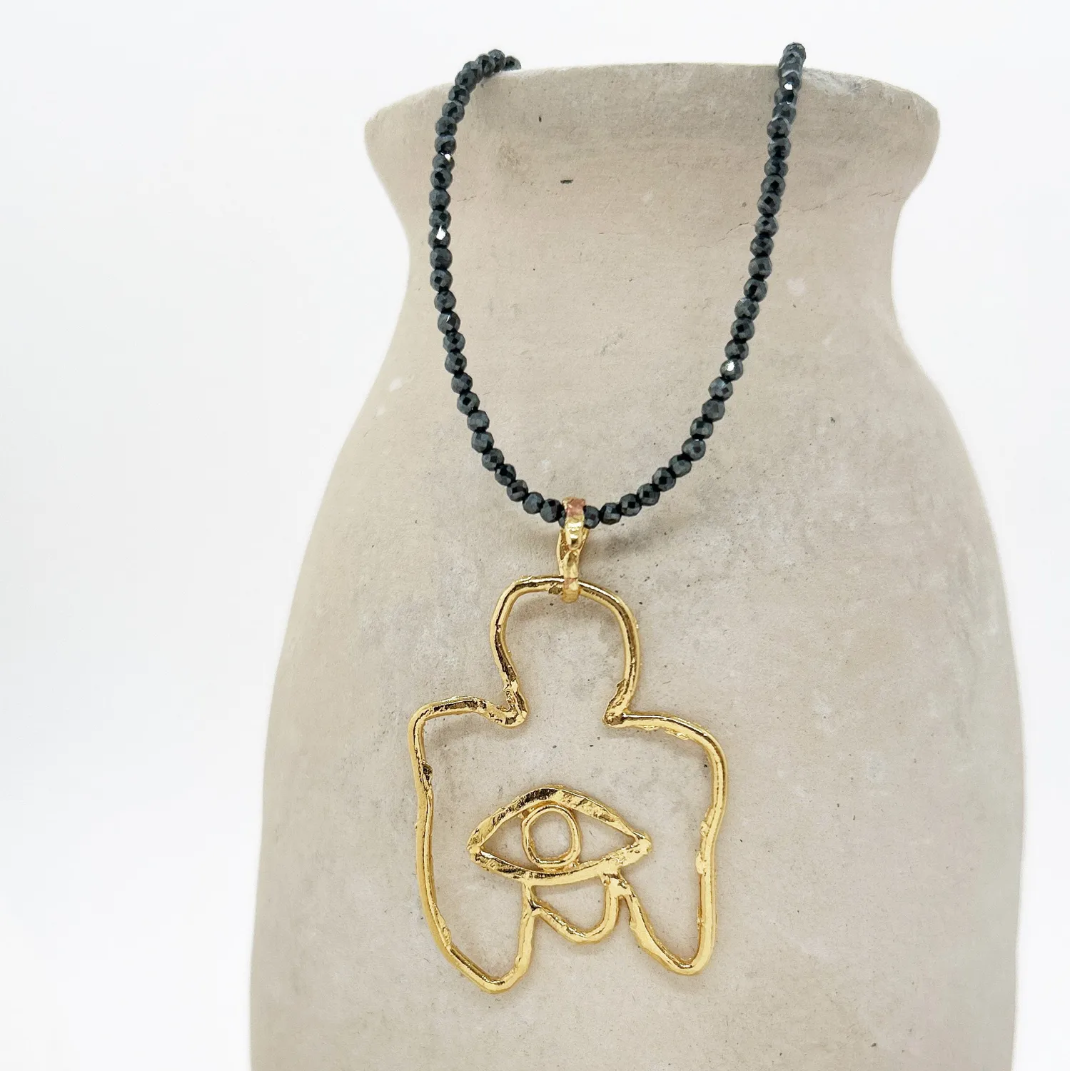 Elise Tsikis Yagul collier tout or oeil 55 cm hématite