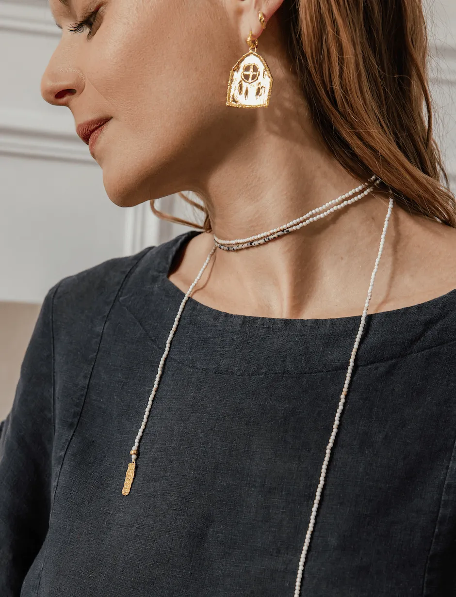 Elise Tsikis Oikos boucles d'oreilles maison dorée